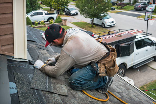 Professional Roof Replacement technician working in Prudenville, MI